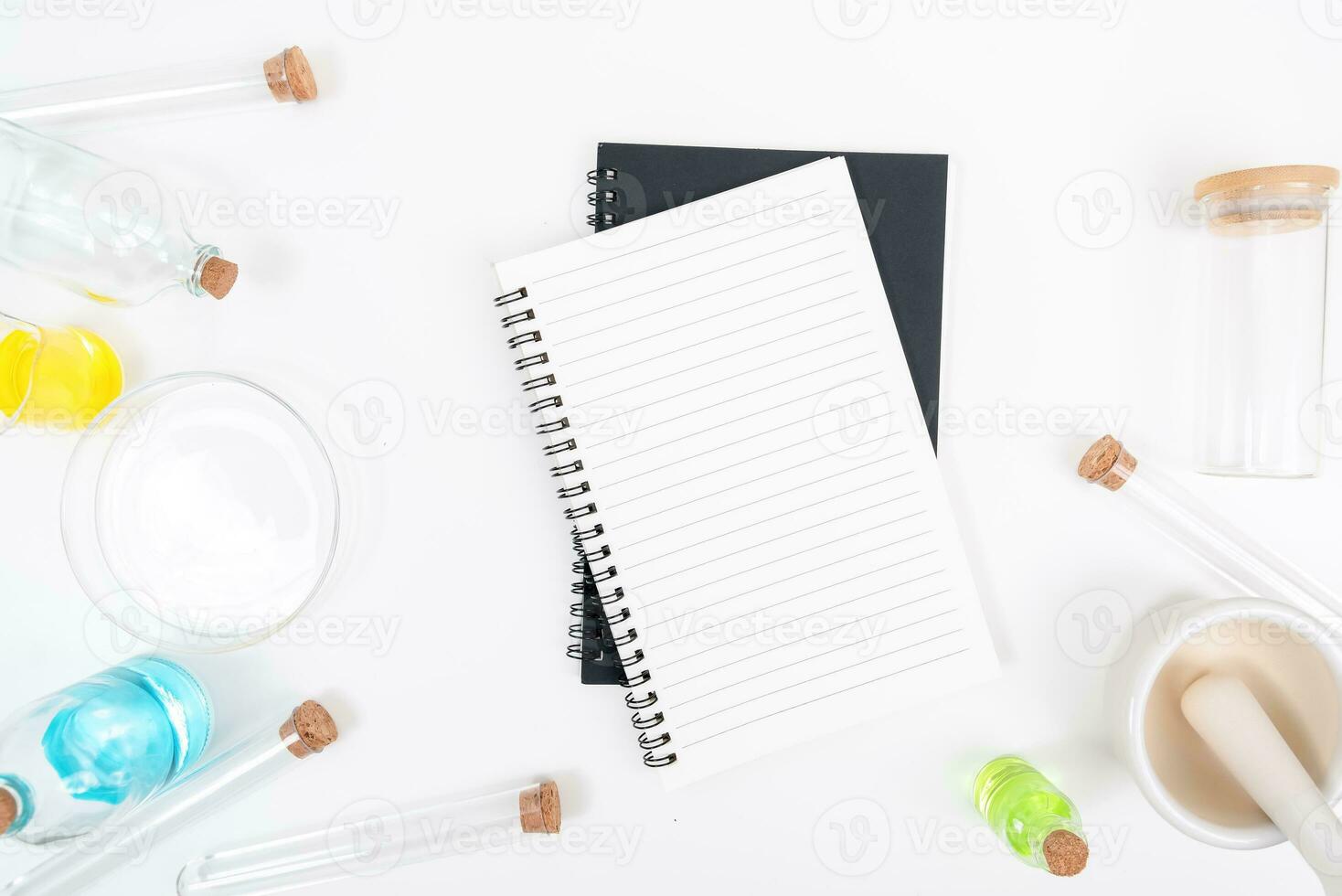 Top view science lab chemistry flask with beakers, flasks, and test tubes filled with colorful liquids photo