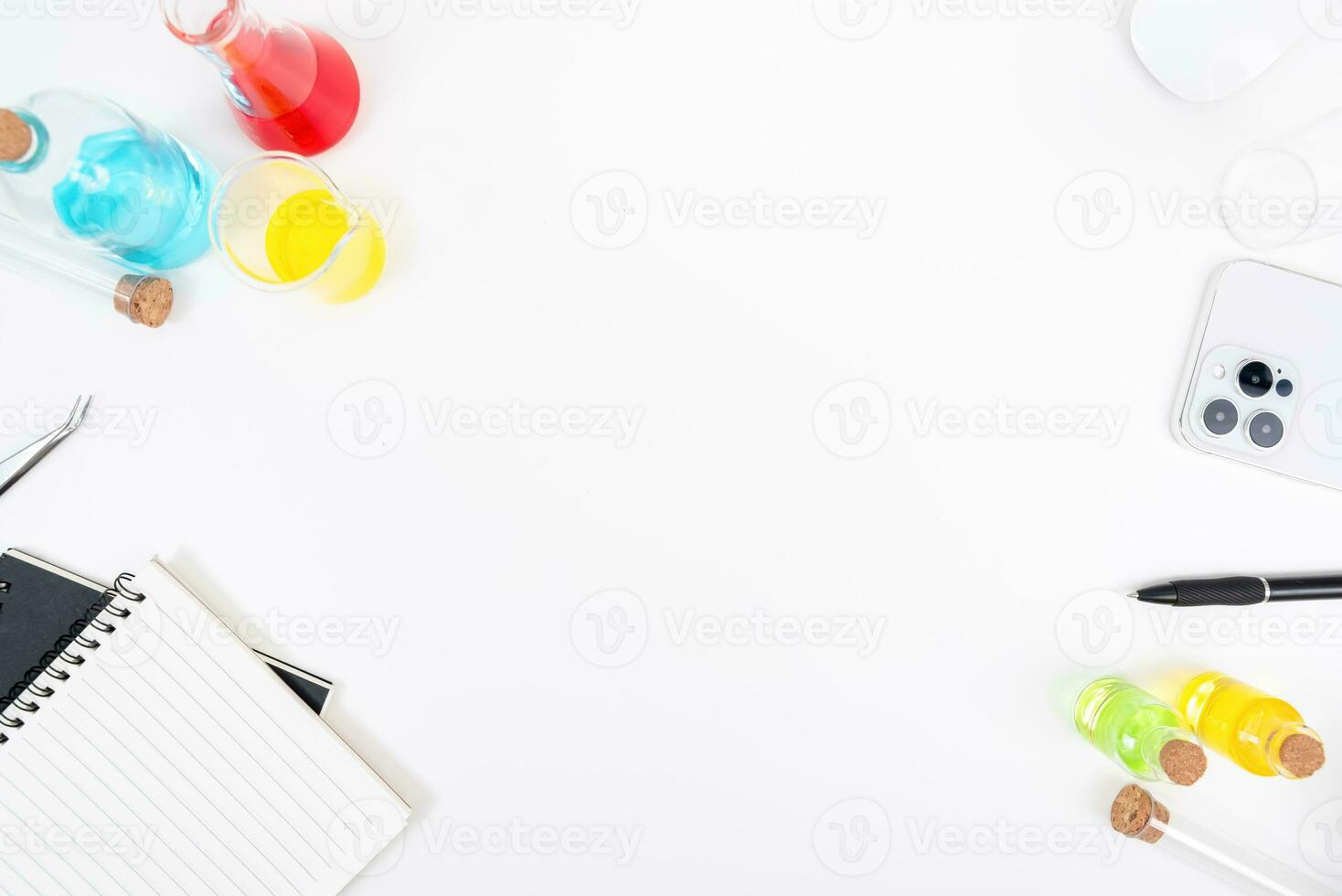 Top view science lab chemistry flask with beakers, flasks, and test tubes filled with colorful liquids photo