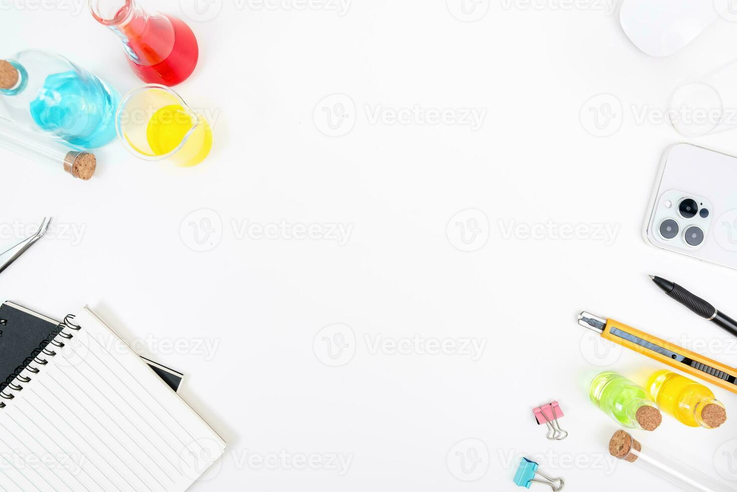 Top view science lab chemistry flask with beakers, flasks, and test tubes filled with colorful liquids photo