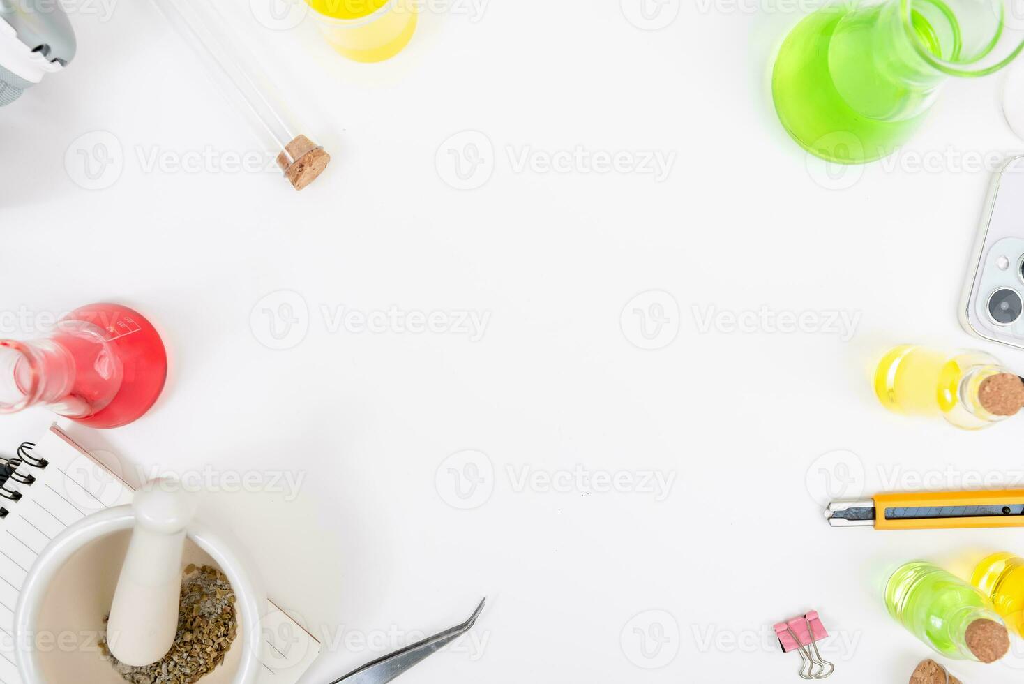 Top view science lab chemistry flask with beakers, flasks, and test tubes filled with colorful liquids photo