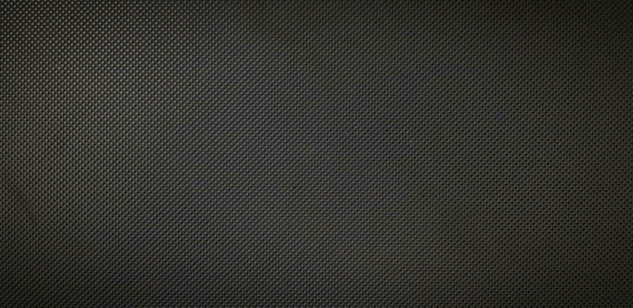 Seamless pattern abstract black background. Art wallpaper and Texture of conveyor belt surface. photo