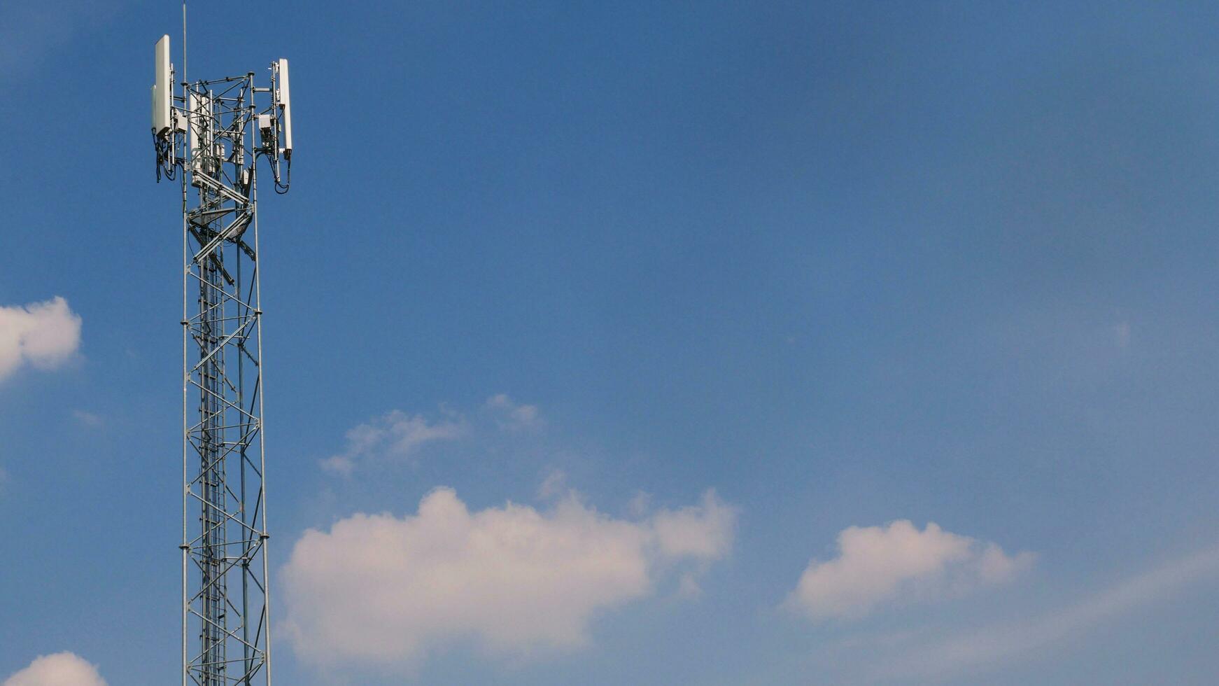 Telephone towers used to broadcast signals at dusk. photo