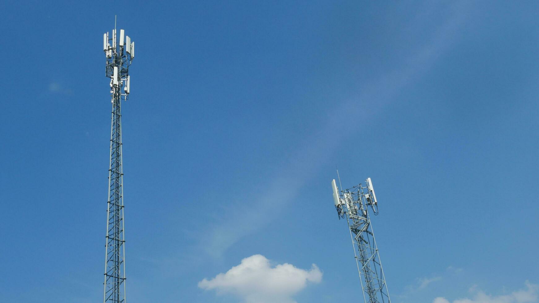 Telephone towers used to broadcast signals at dusk. photo