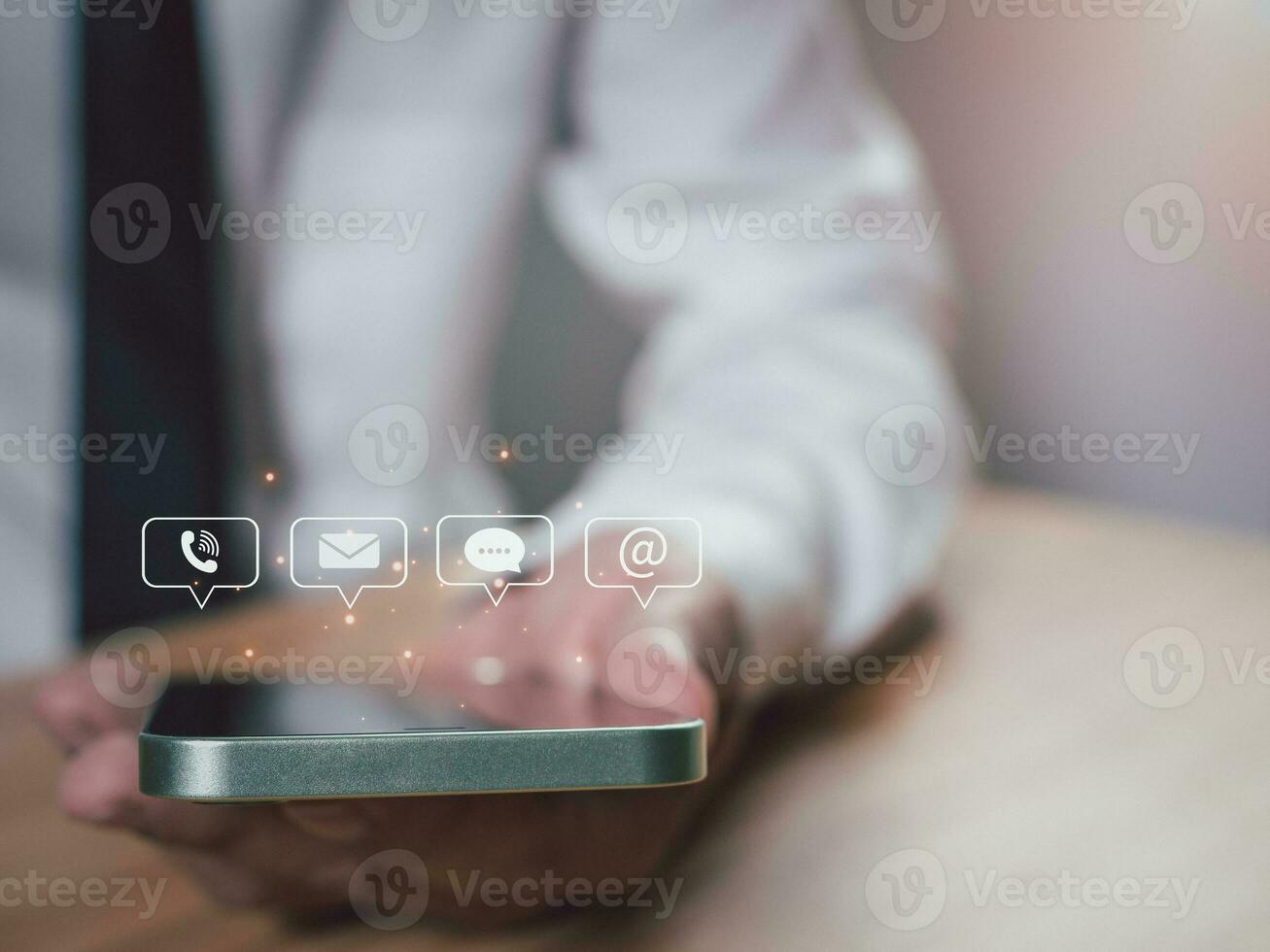 Website page, contact us or email marketing concept, customer support hotline, contact us. Businesswoman sitting and working on computer. Email, phone, address, chat message icon. photo