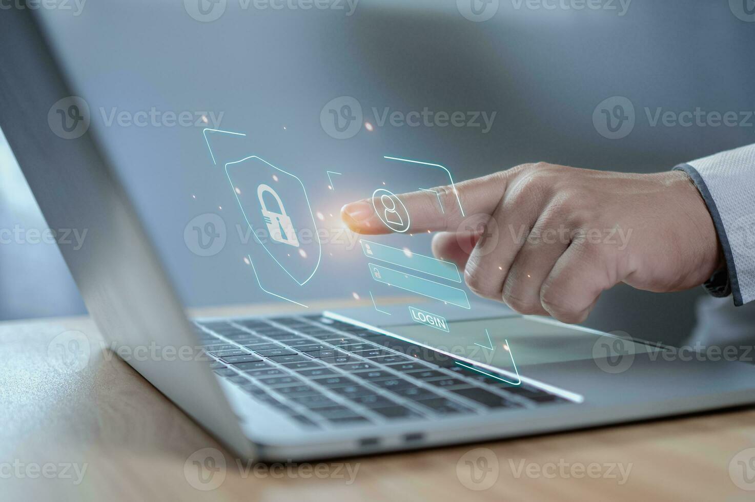 Human hand working on computer and protection icon. Represents the code protection. Security concept and communication technology photo