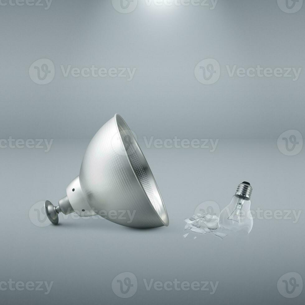 lamp and Broken light bulb on studio floor photo