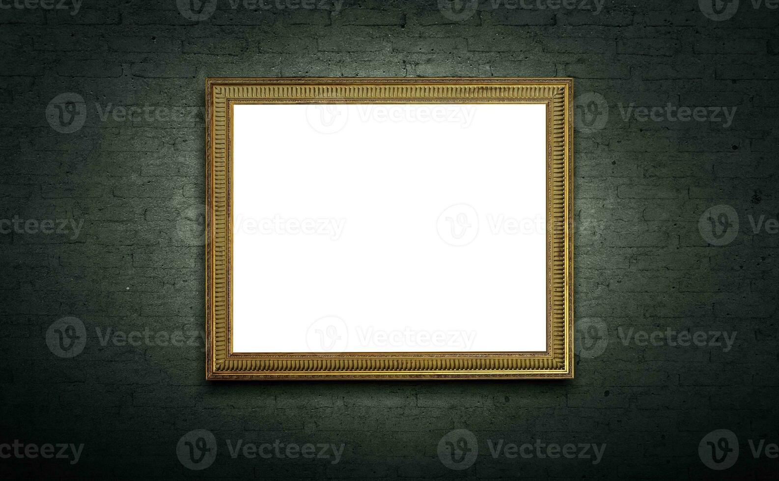 Golden picture frame on dark wall photo