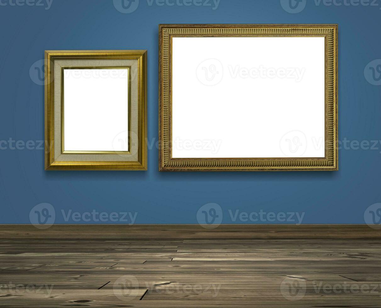 Golden picture frame on Colored wall and brown wooden floor photo