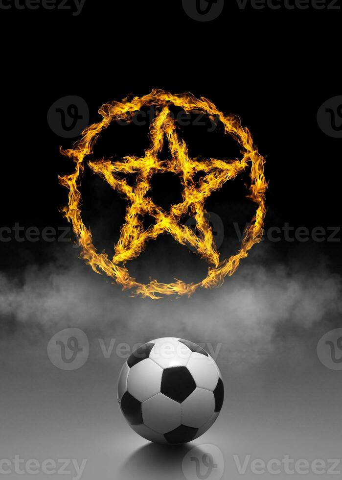 Soccer ball and ring of fire in black smoke background photo