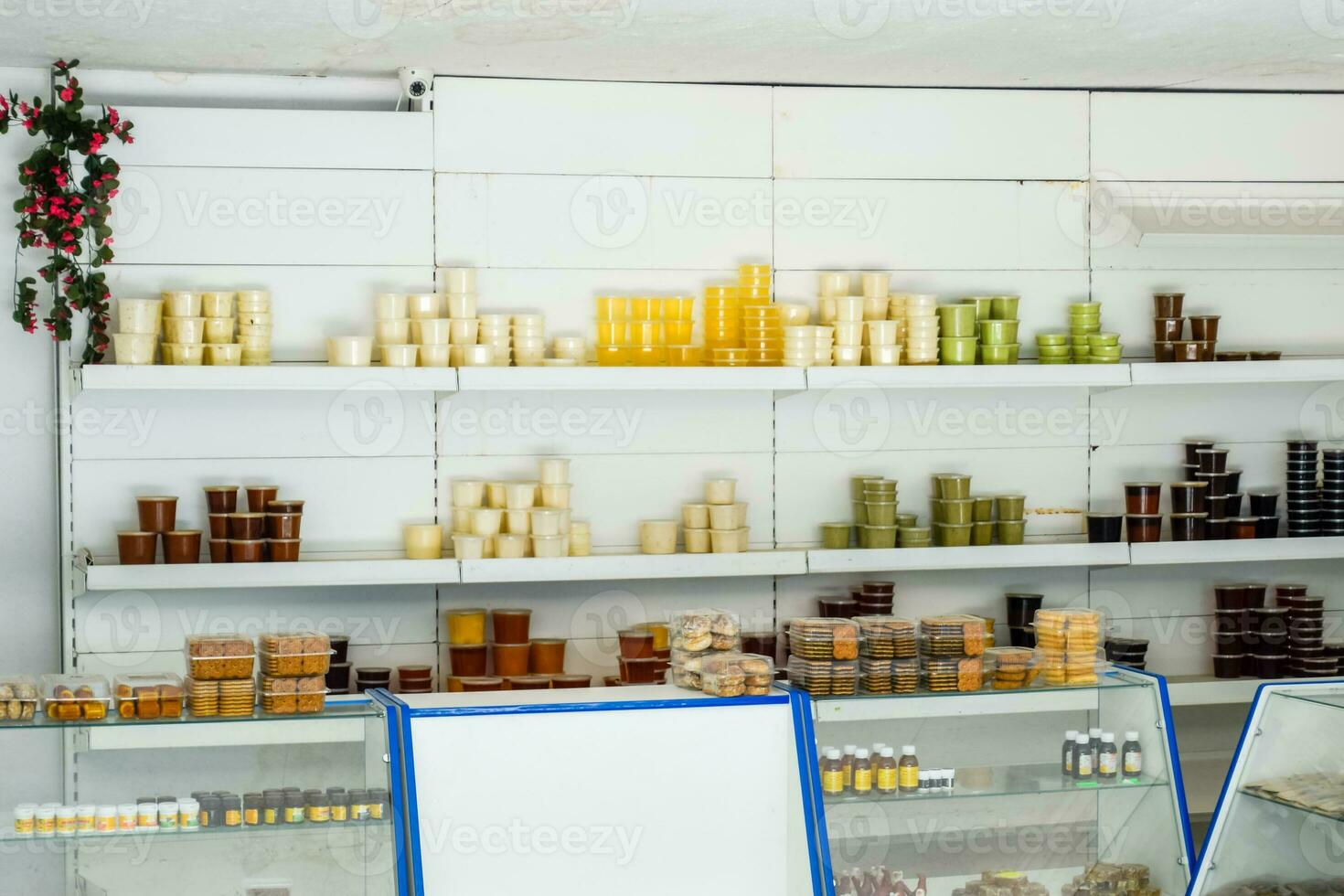 Counter with honey. Different types of honey in cans. Sale of honey. photo