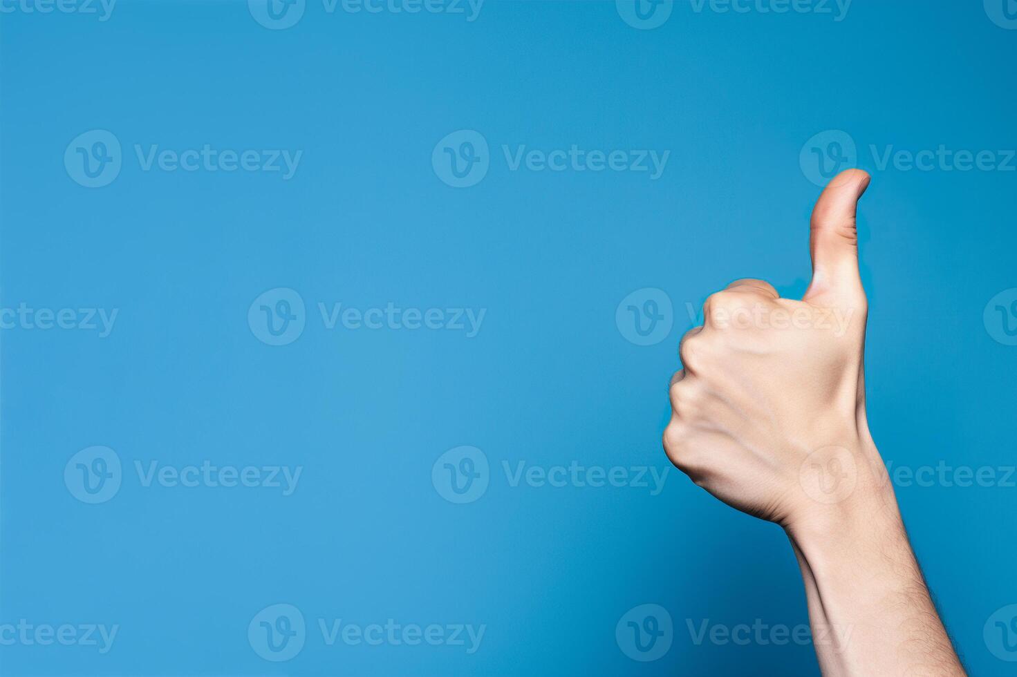 Realistic thumb up hand gesture on blue background with copy space. Like. Good feedback, positive reaction. Validation and approval. Empty space for text. . photo