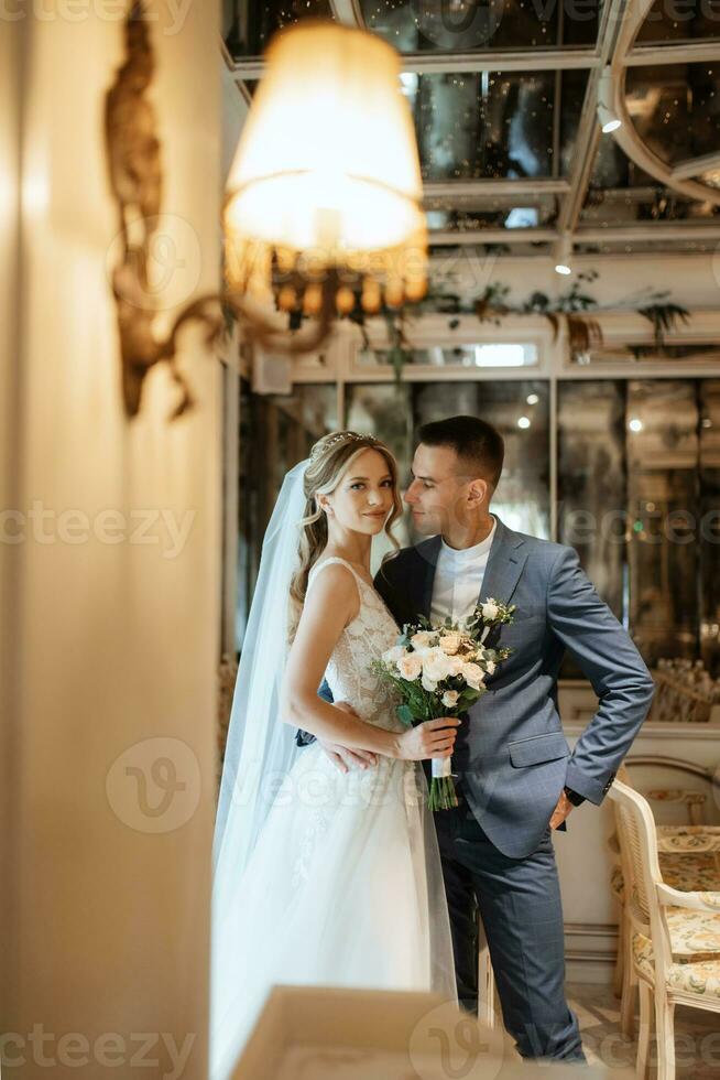 bride and groom inside a cocktail bar photo