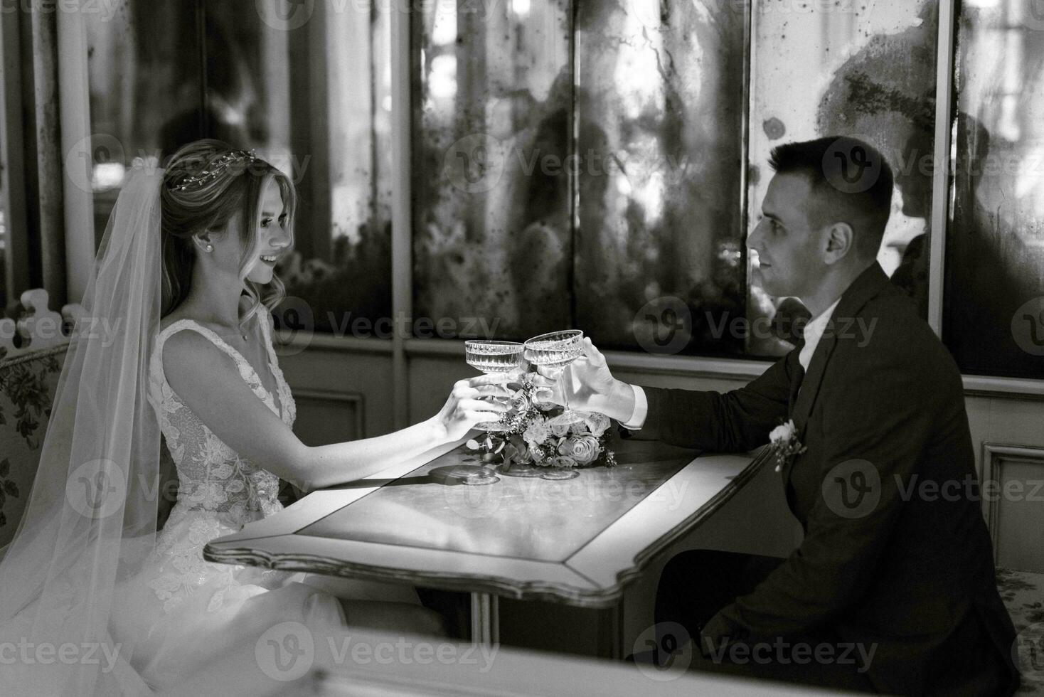 bride and groom inside a cocktail bar photo