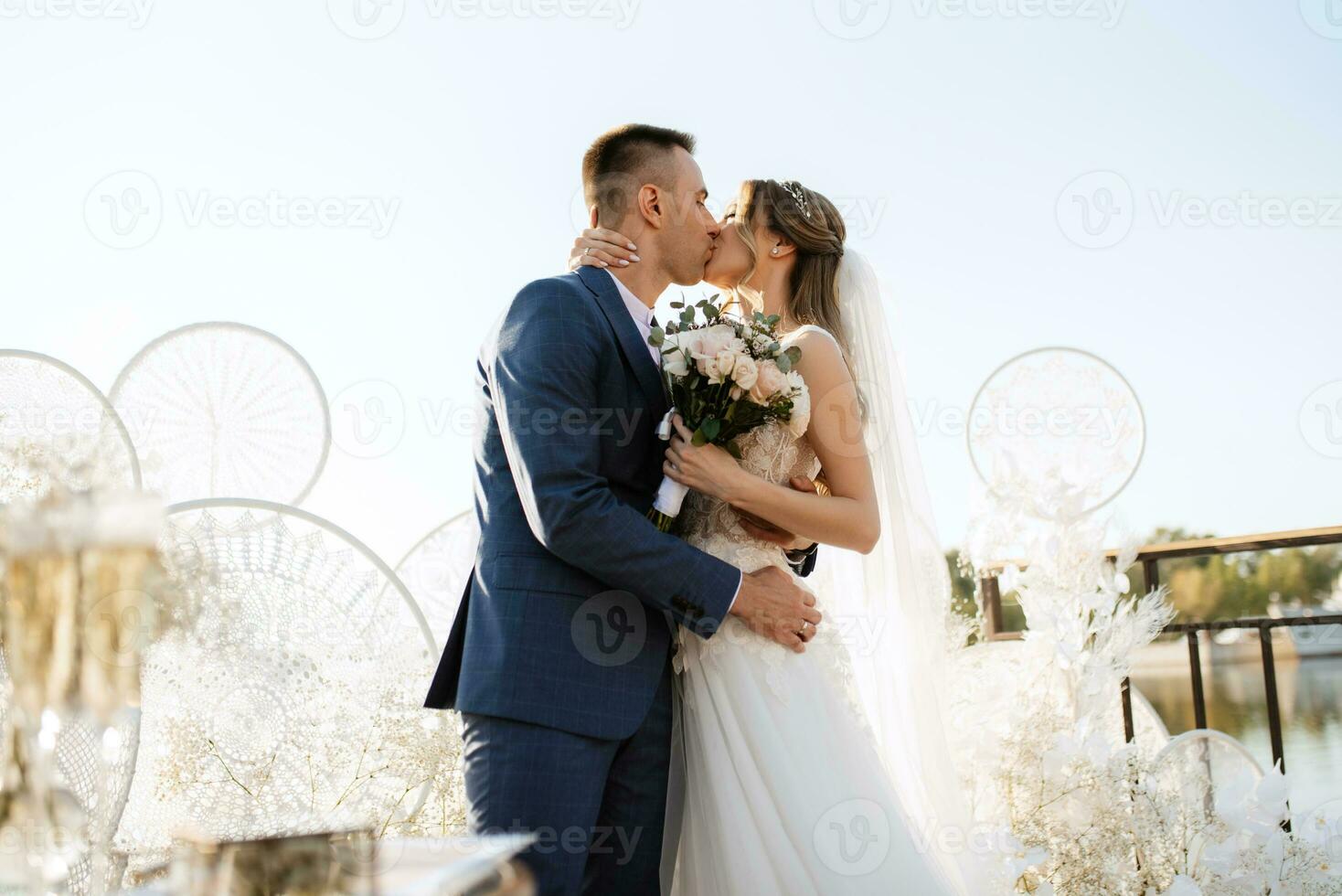 wedding ceremony of the newlyweds on the pier photo