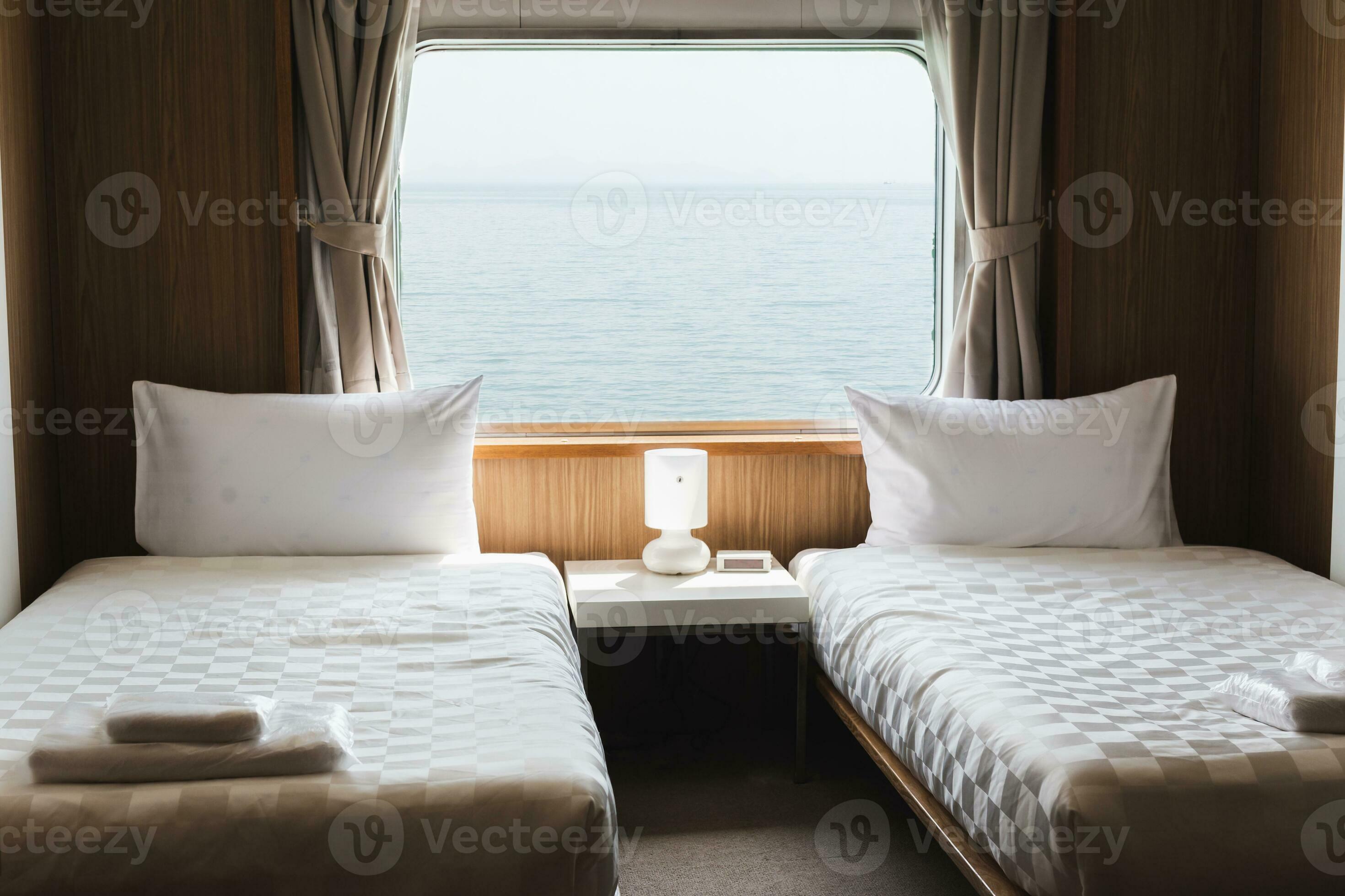 Bedroom with interior of double passenger cabin ferry ship with ocean