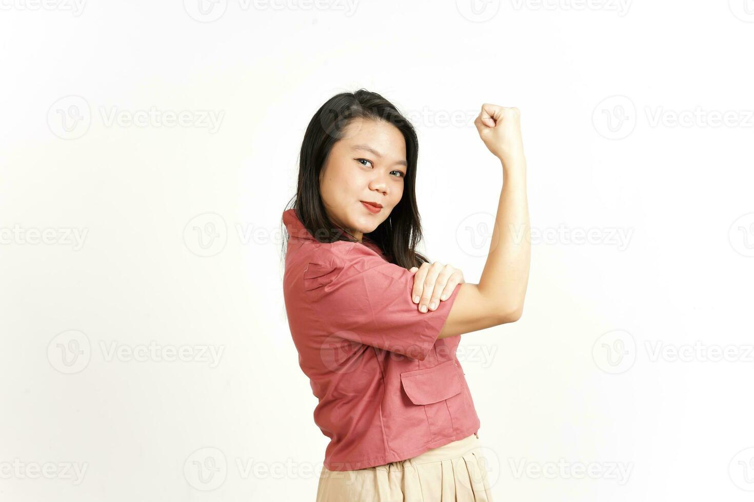 Showing strength and rise arms Of Beautiful Asian Woman Isolated On White Background photo