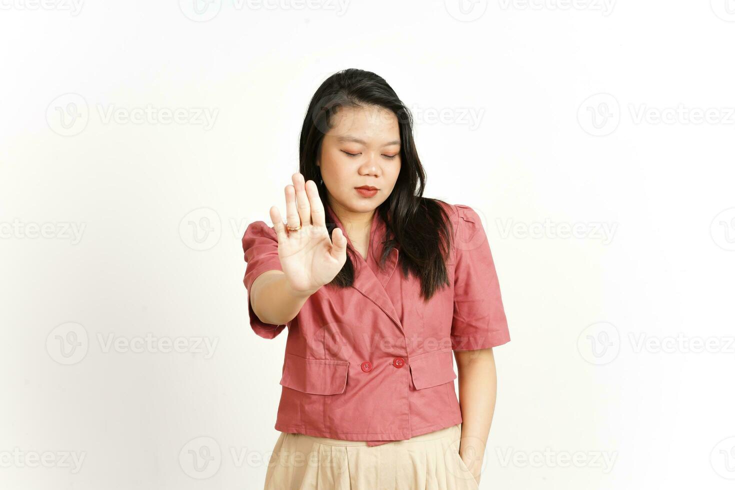 Stop Rejection Gesture Of Beautiful Asian Woman Isolated On White Background photo