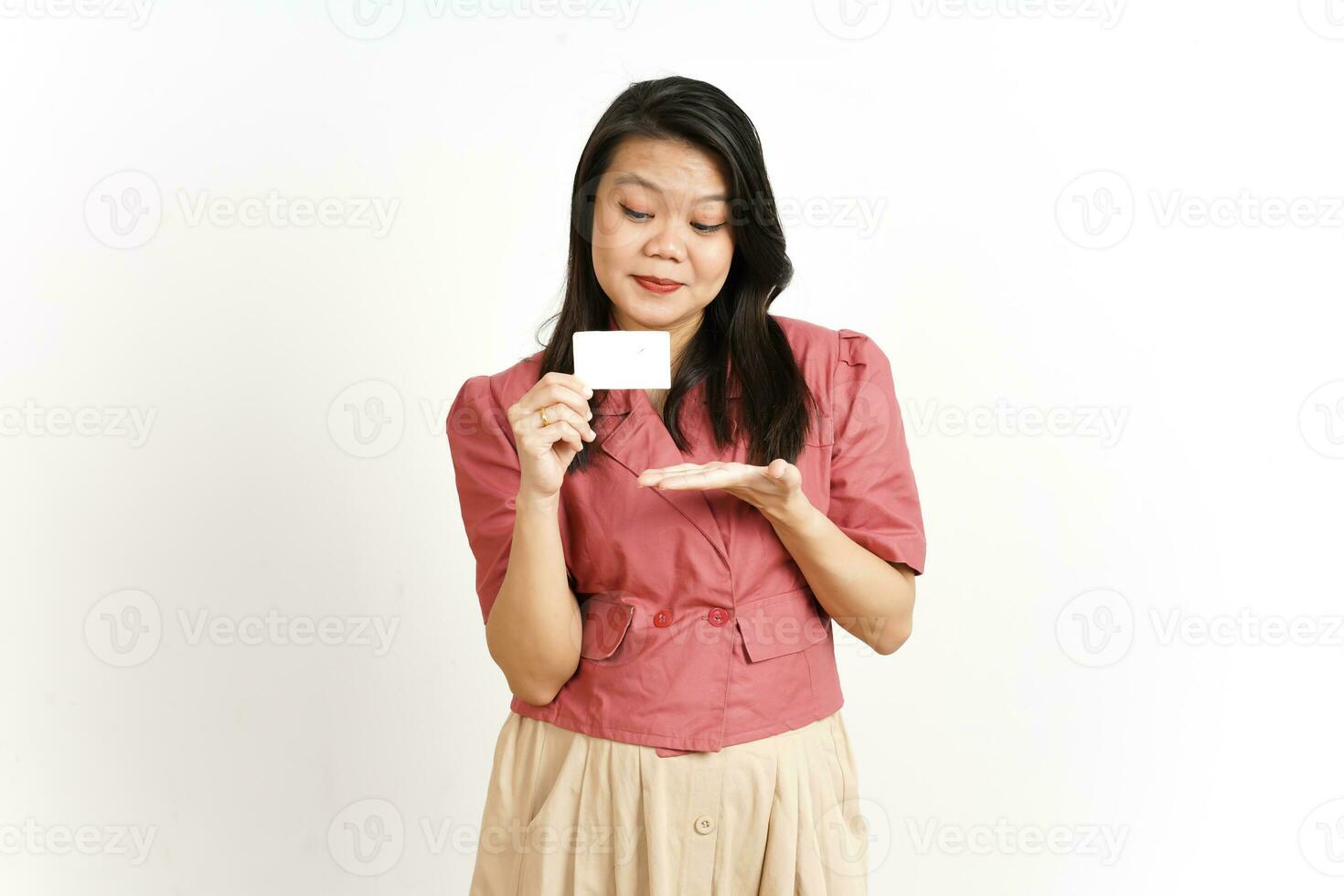 Holding and Showing Blank Credit Card Of Beautiful Asian Woman Isolated On White Background photo