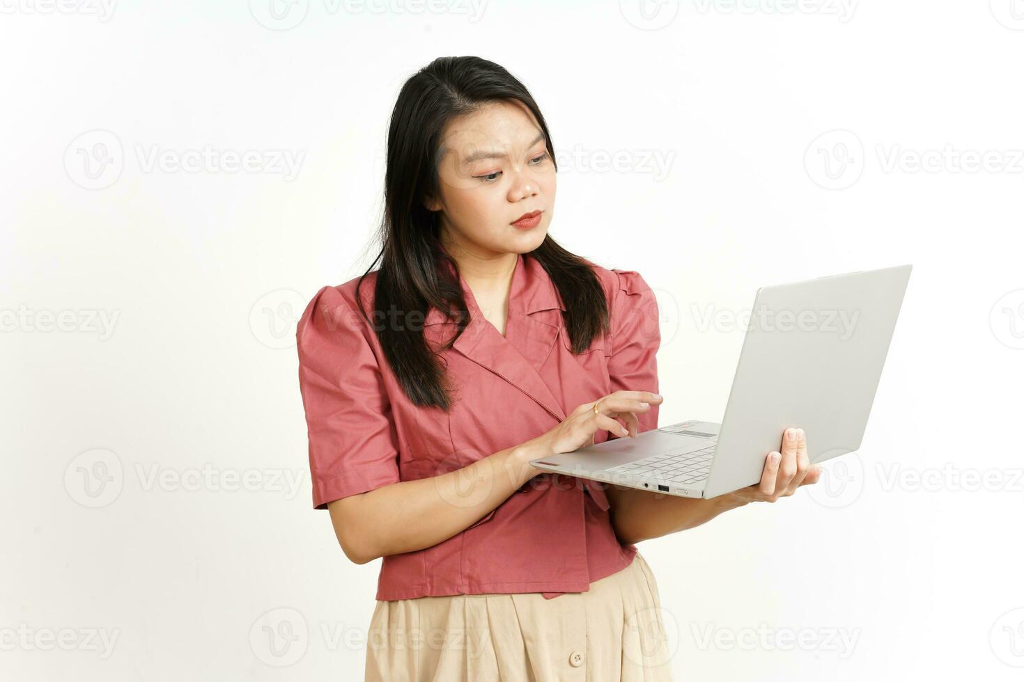 Standing and Working With Laptop Of Beautiful Asian Woman Isolated On White Background photo