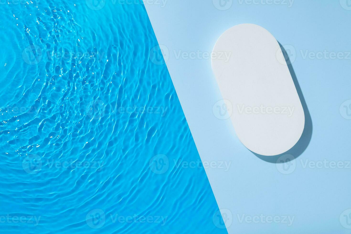 Mock up podium or pedestal flat lay with blue water waves. Hot summer scene for your product top view photo
