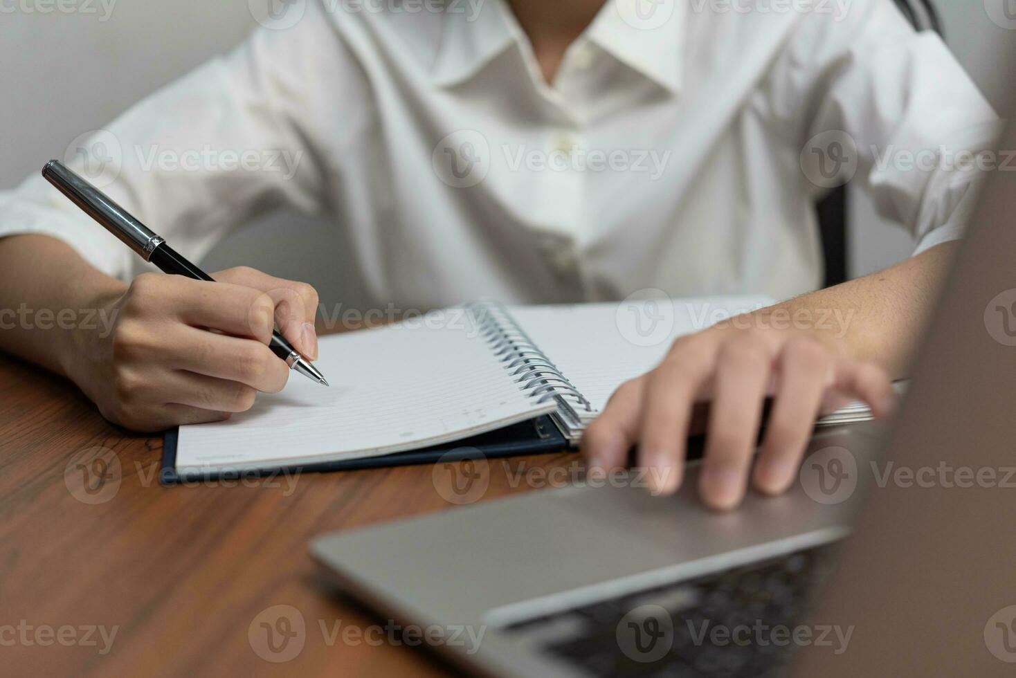 Education, development and intelligence cognition learning concept. Businessperson reading and writing on book.education studying knowledge development and cognition learning concept. photo