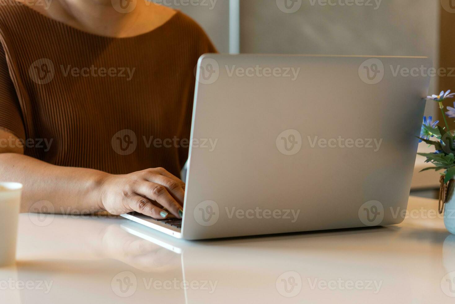 Woman working typing on keyboard laptop computer searching information on keyboard close up. technology digital, online communication, working from home, freelancing, e-commerce, photo