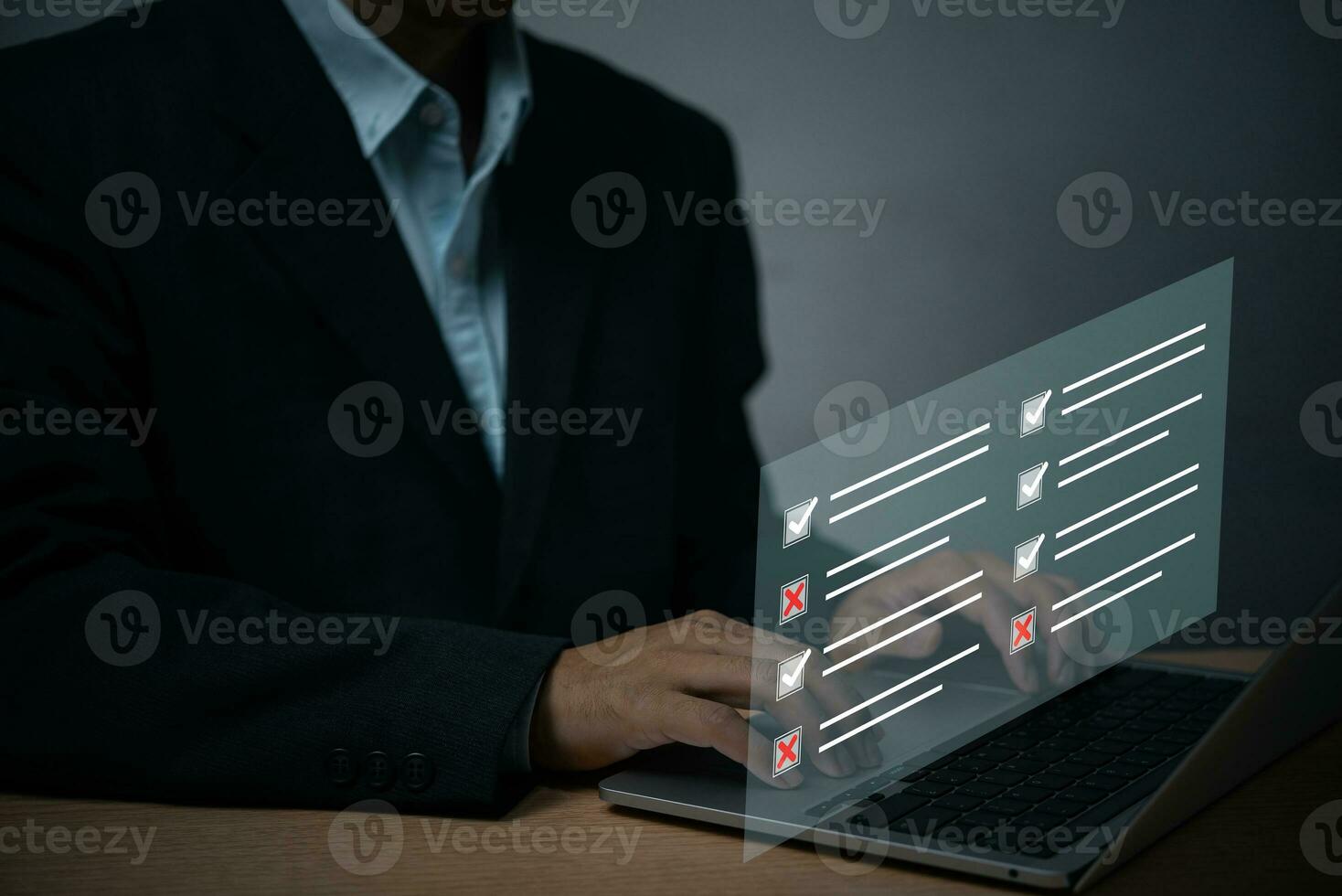 man chooses questionnaire with checkbox, survey form online, answer questions in the exam of test business checklist and filling survey form online using technology for education, learning. photo