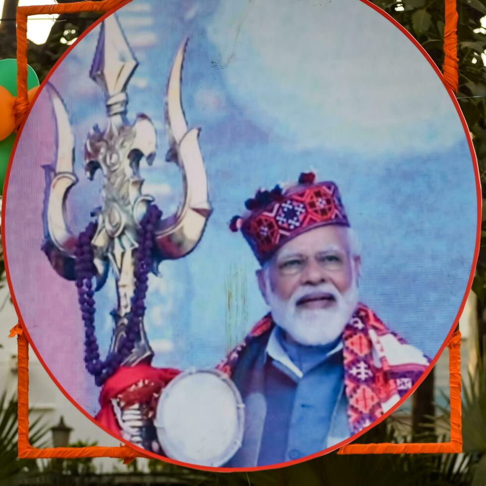 New Delhi, India - January 16 2023 - Prime Minister Narendra Modi cut out during BJP road show, the statue of PM Modi while attending a big election rally in the capital photo