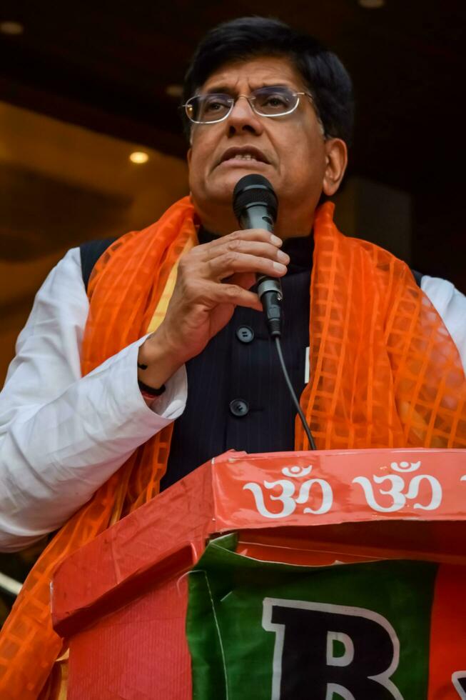 New Delhi, India - November 27 2022 - Piyush Goyal Cabinet Minister and core member of Bharatiya Janata Party - BJP during a rally in support of BJP candidate ahead of MCD local body Elections 2022 photo