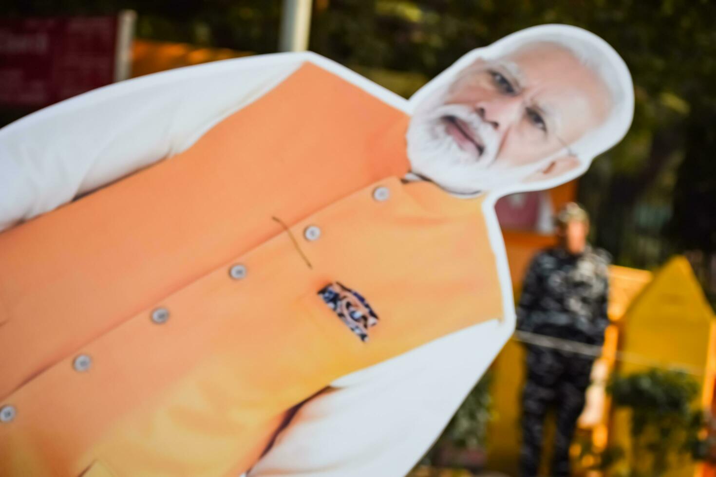 New Delhi, India - January 16 2023 - Prime Minister Narendra Modi cut out during BJP road show, the statue of PM Modi while attending a big election rally in the capital photo