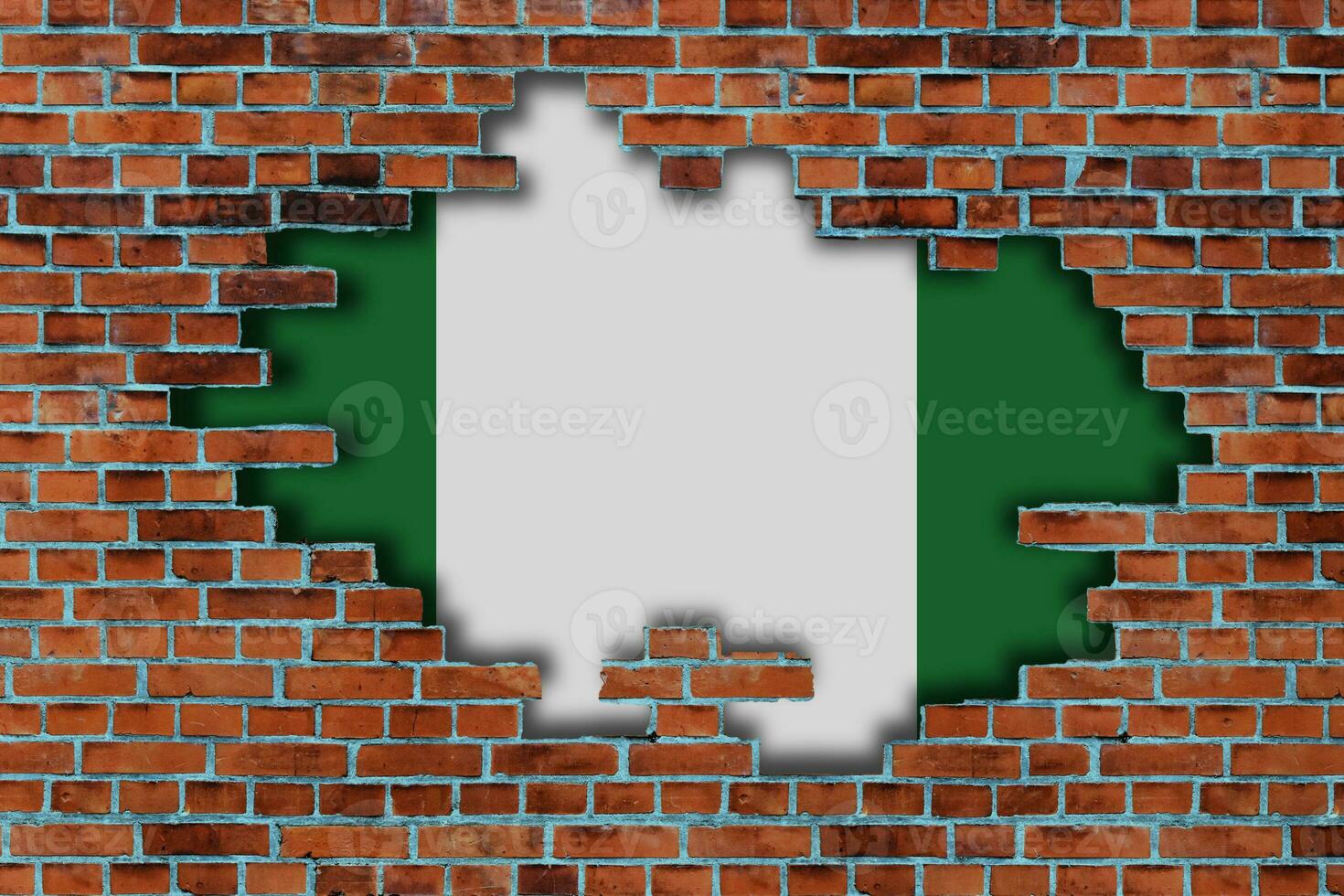 3D Flag of Nigeria behind the broken old stone wall background. photo