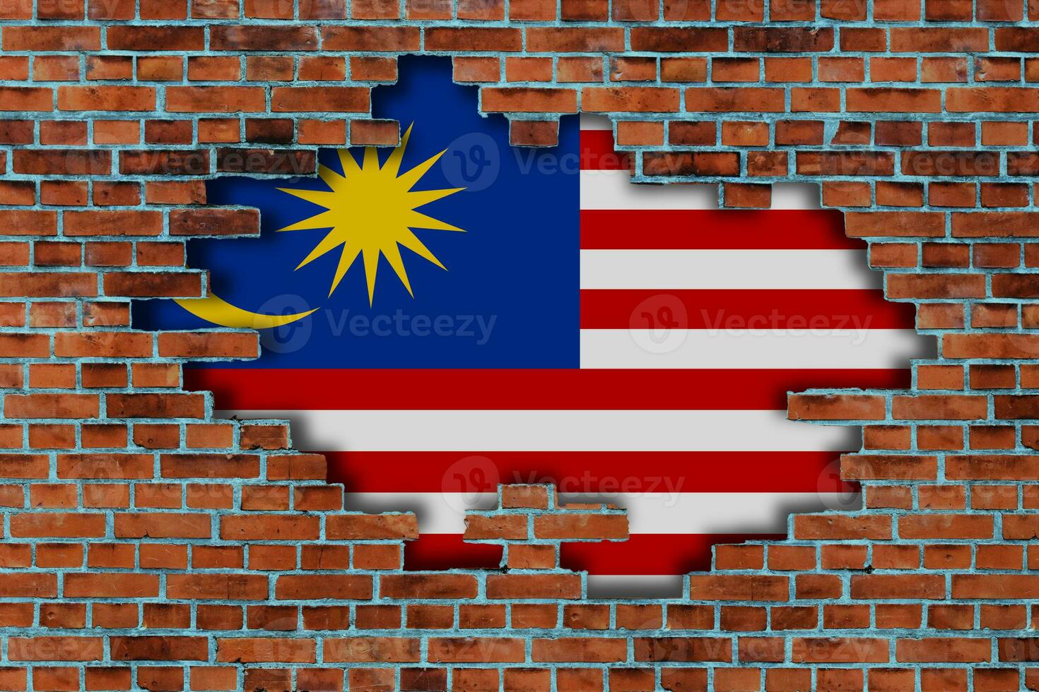 3D Flag of Malaysia behind the broken old stone wall background. photo