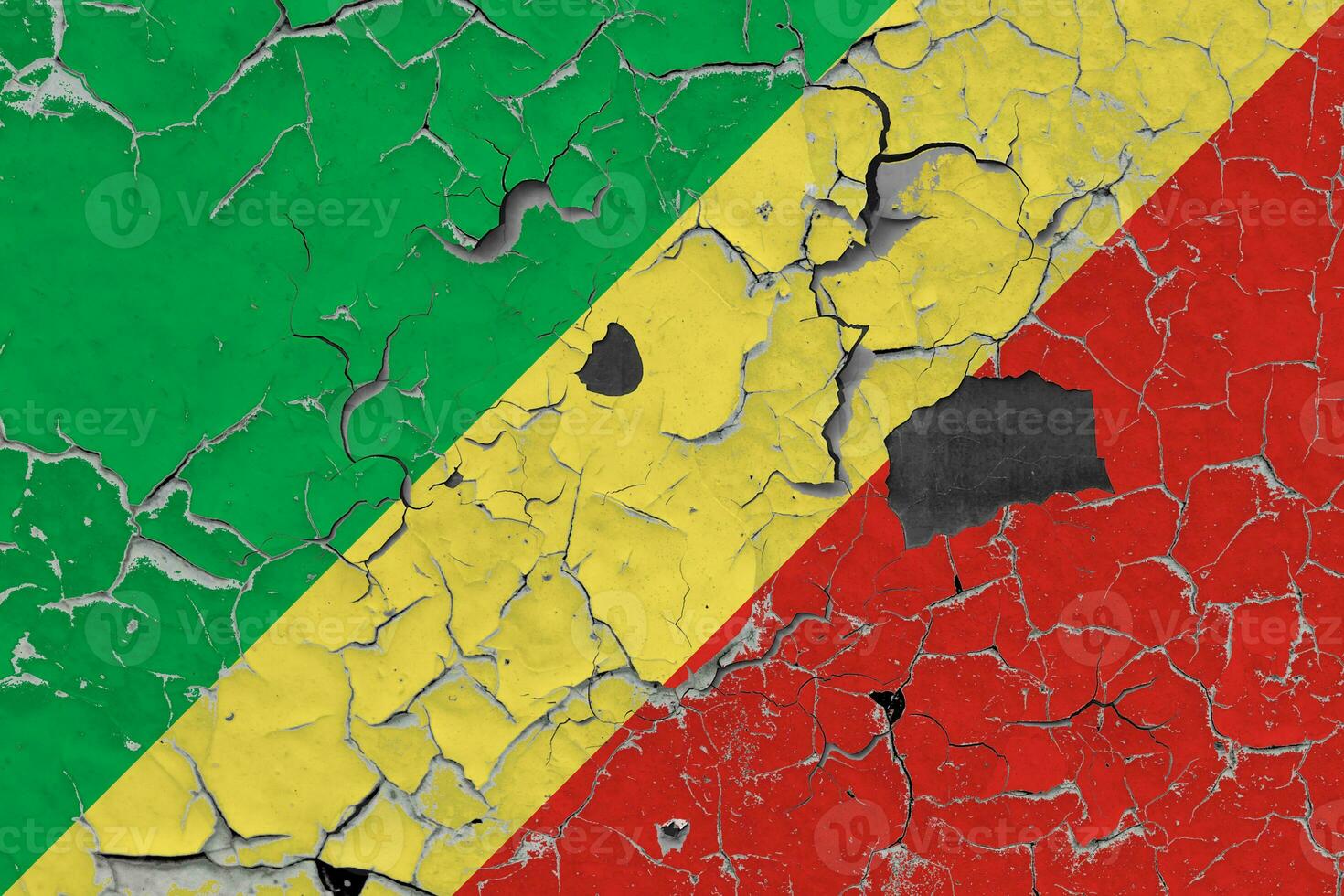 3D Flag of Republic of the Congo on an old stone wall background. photo