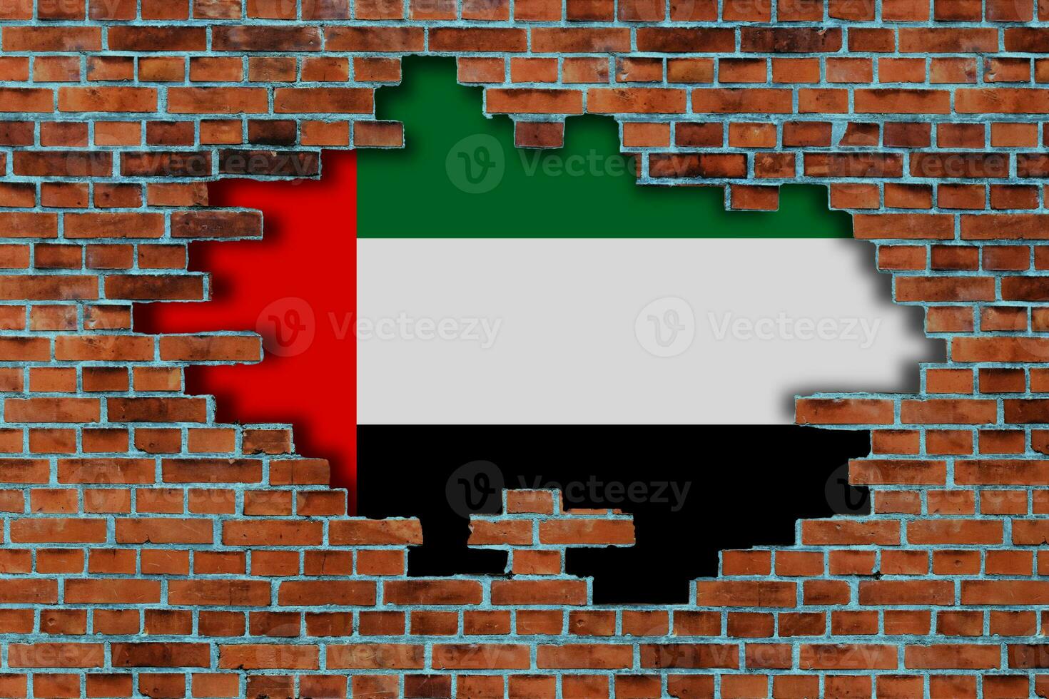 3D Flag of United Arab Emirates behind the broken old stone wall background. photo