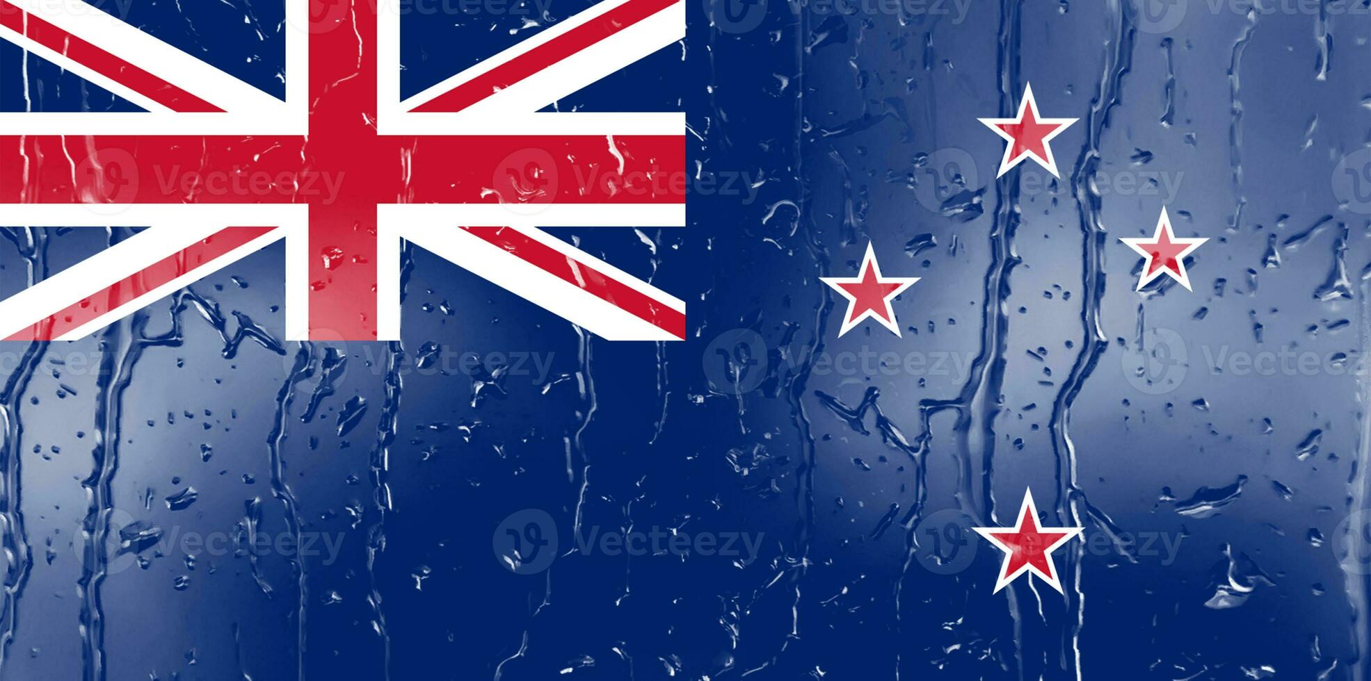 3D Flag of New Zealand on a glass with water drop background. photo