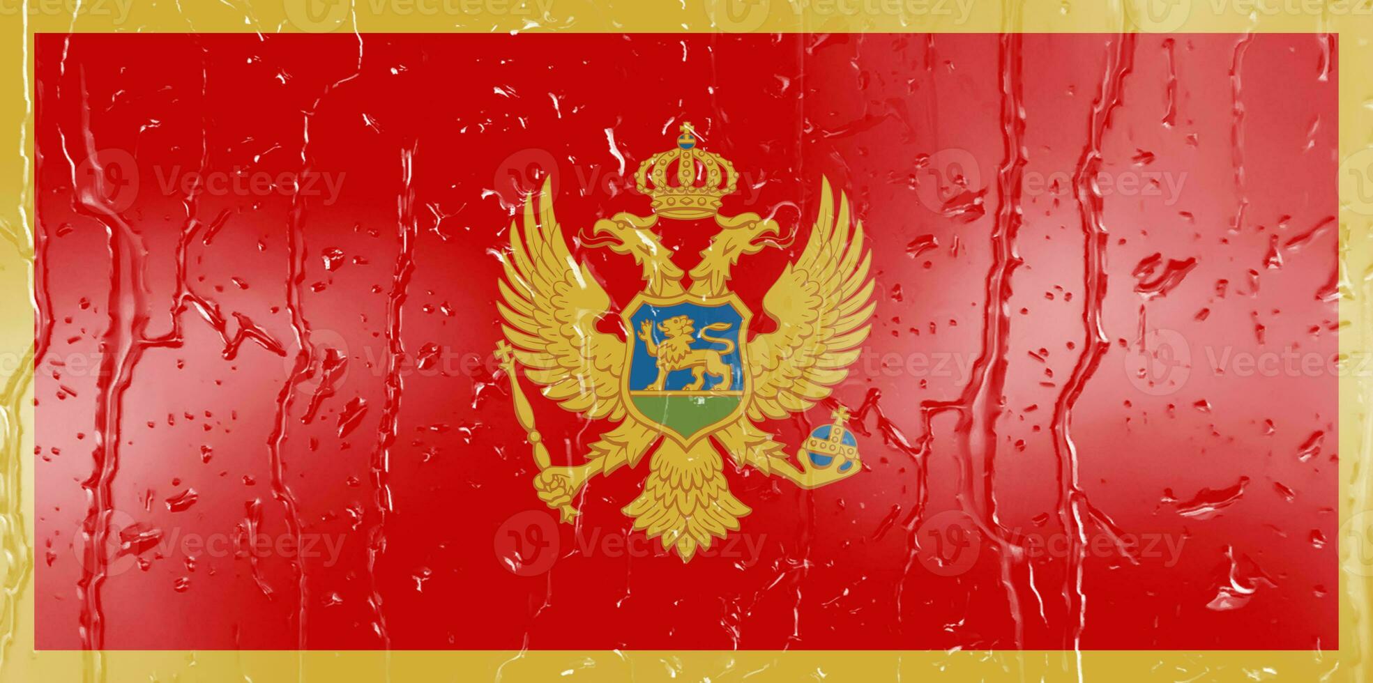 3D Flag of Montenegro on a glass with water drop background. photo