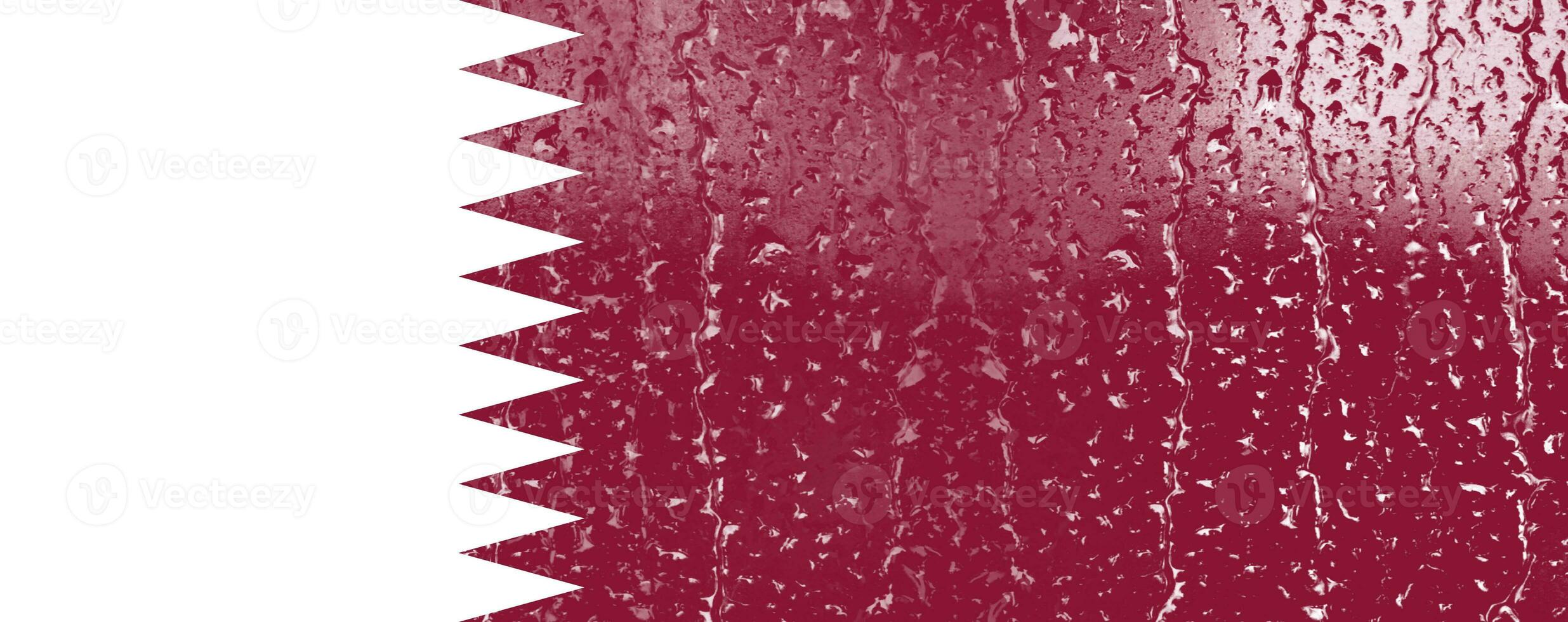 3D Flag of Qatar on a glass with water drop background. photo