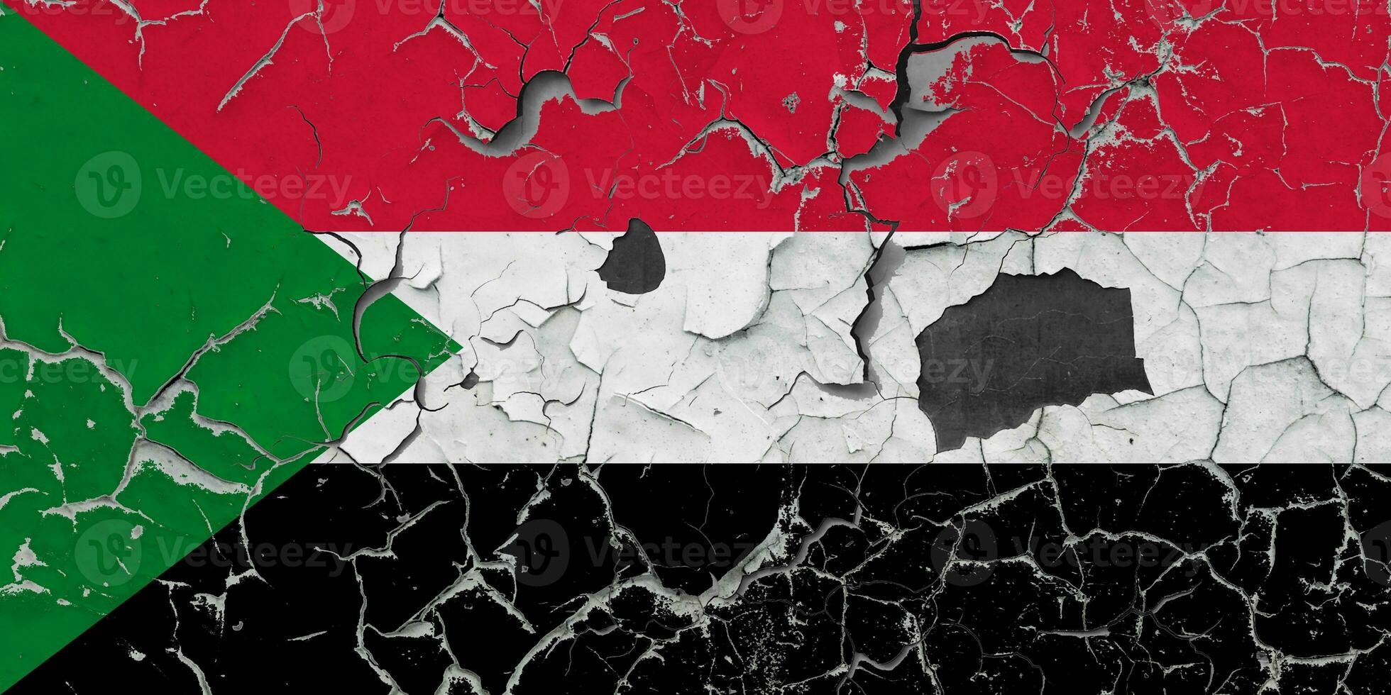 3D Flag of Sudan on an old stone wall background. photo