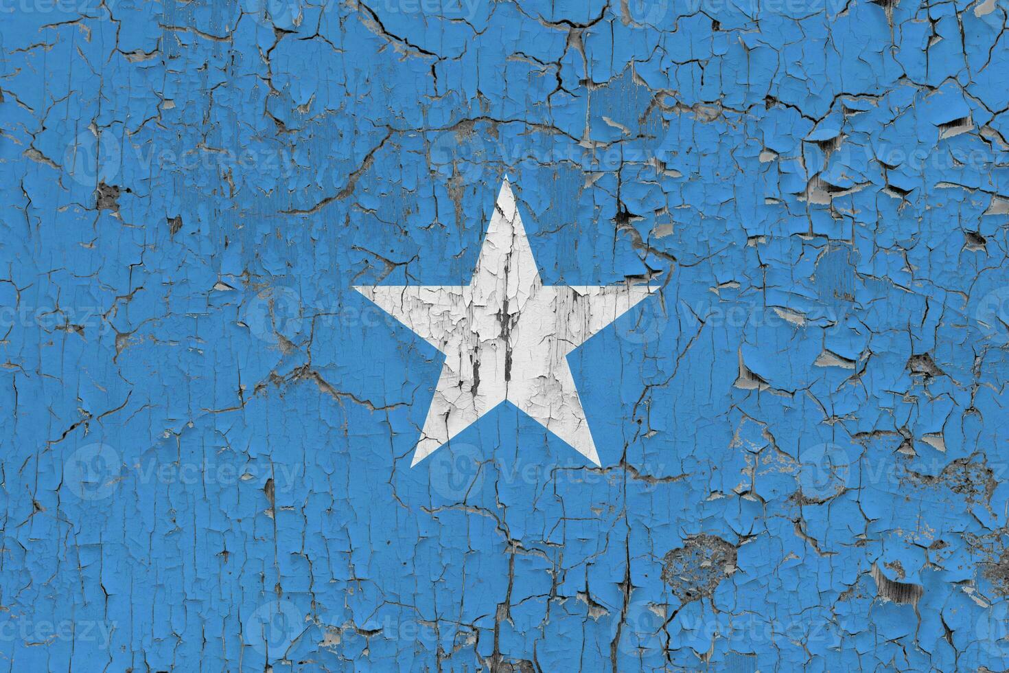 3D Flag of Somalia on an old stone wall background. photo