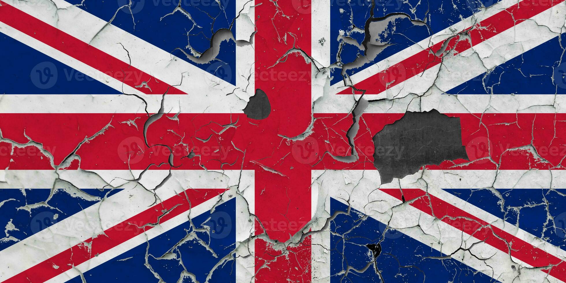 3D Flag of United Kingdom on an old stone wall background. photo