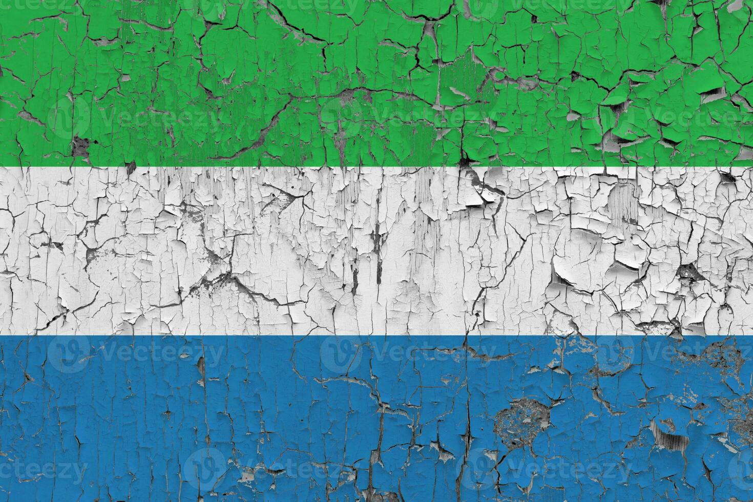 3D Flag of Sierra Leone on an old stone wall background. photo