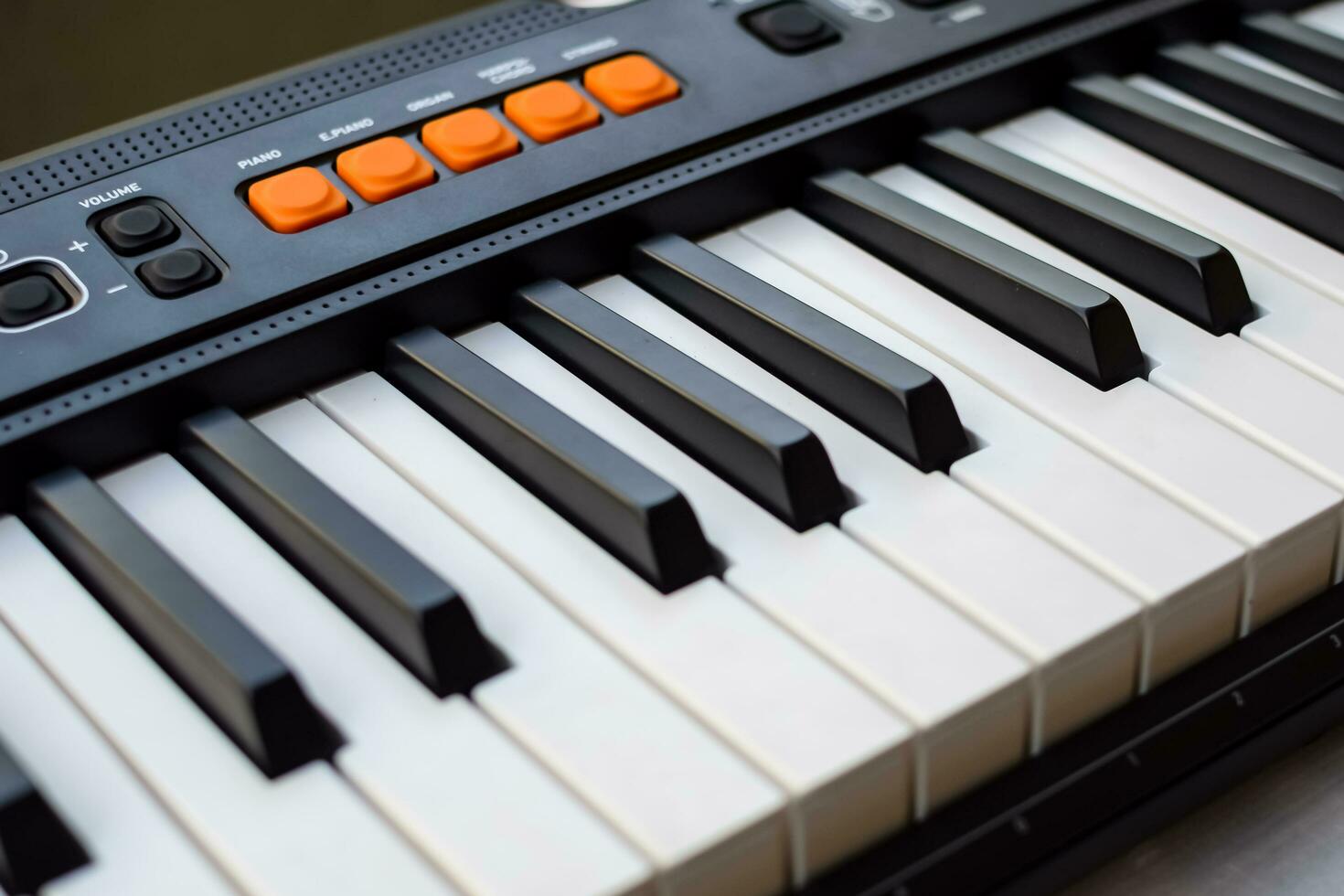 Close-up of piano keys. Piano black and white keys and Piano keyboard musical instrument placed at the home balcony during sunny day. photo