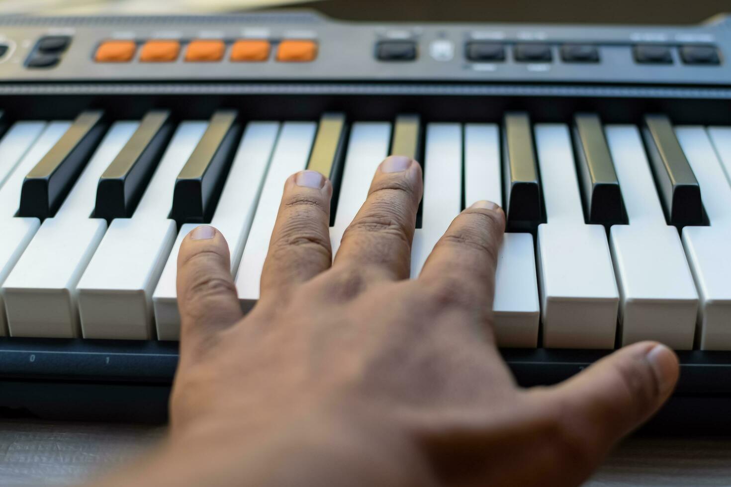 Close-up of piano keys. Piano black and white keys and Piano keyboard musical instrument placed at the home balcony during sunny day. photo