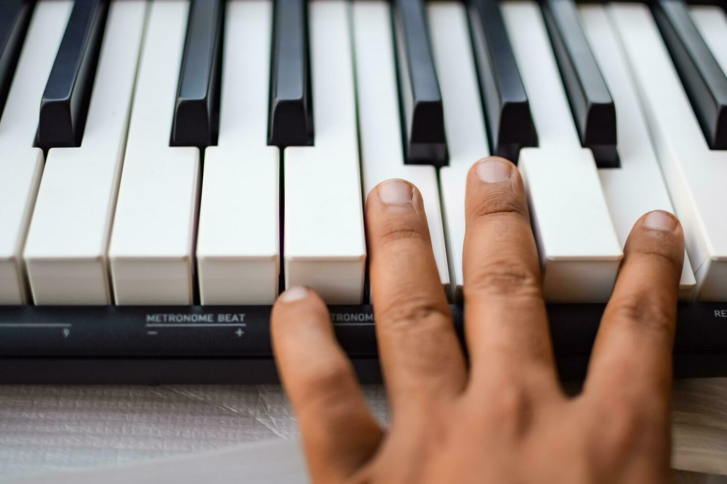 Close-up of piano keys. Piano black and white keys and Piano keyboard musical instrument placed at the home balcony during sunny day. photo