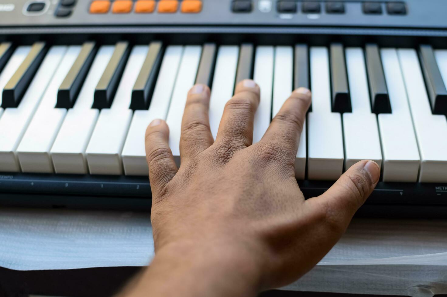 Close-up of piano keys. Piano black and white keys and Piano keyboard musical instrument placed at the home balcony during sunny day. photo