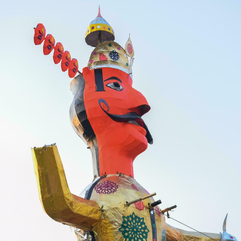 Ravnans being ignited during Dussera festival at ramleela ground in Delhi, India, Big statue of Ravana to get fire during the Fair of Dussera to celebrate the victory of truth by Lord Rama photo