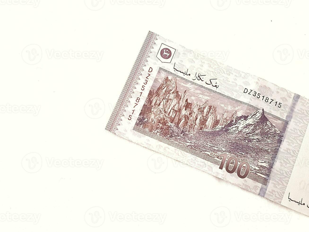 Isolated white photo of one piece of 100 ringgit malaysian bank notes