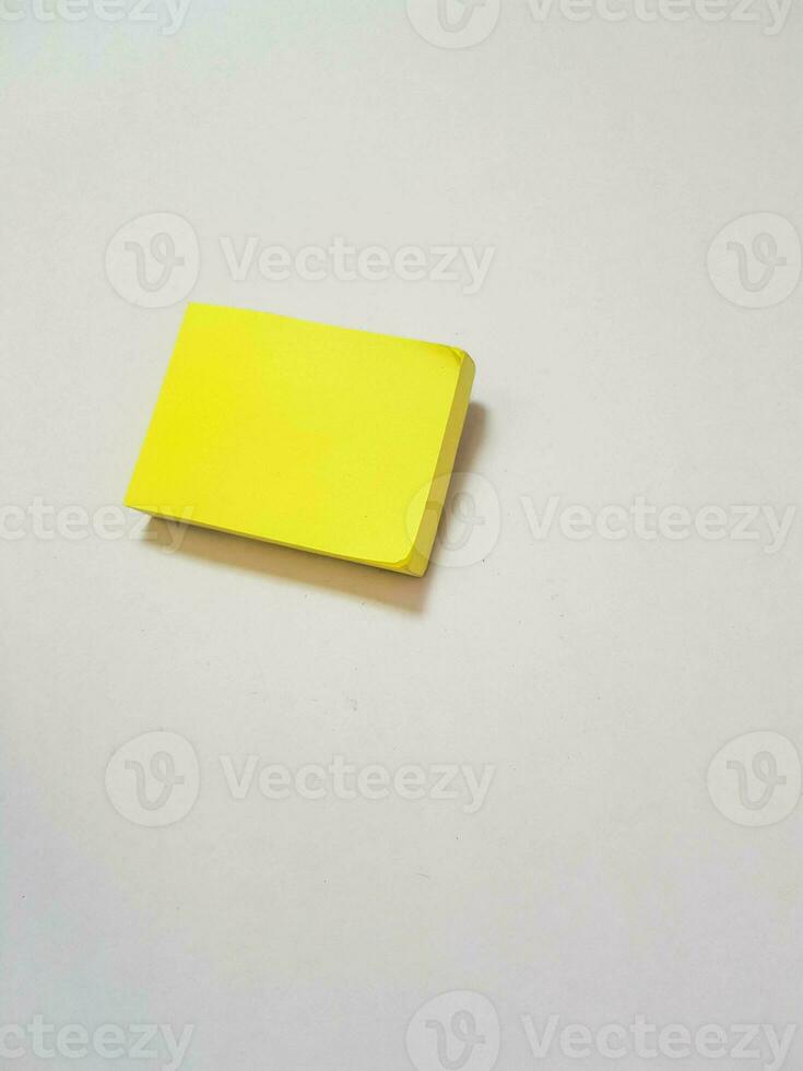 Isolated white photo of a yellow sticky note. These sticky notes look floating.