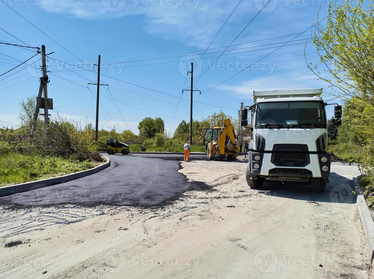 A truck carrying construction sand or concrete. The concept of reloading on the roads and renting a dump truck for work photo