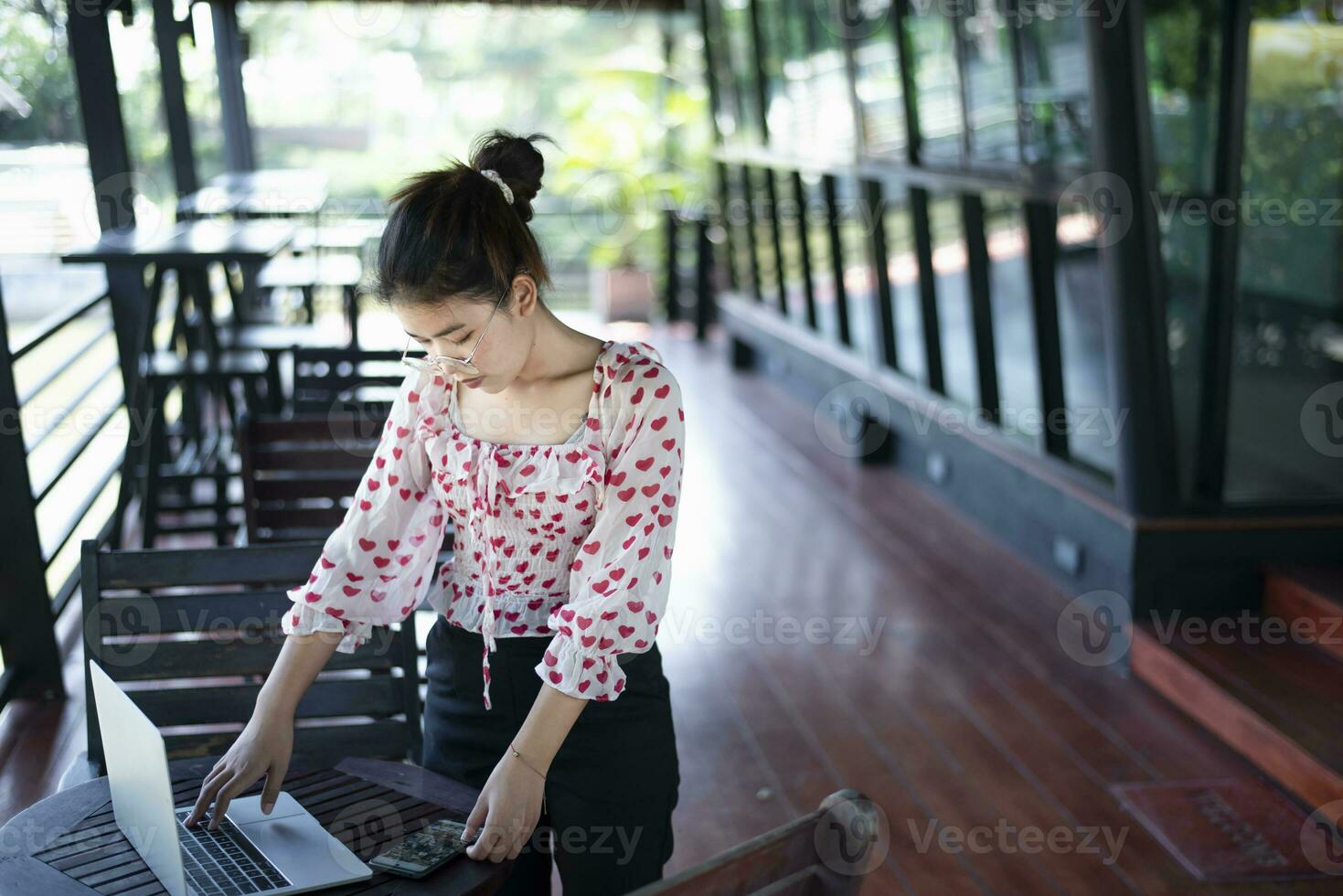 Sad unemployed young smart asian woman, student, looking for a job, hoping to get a dream job, asking for support. photo